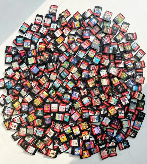 Switch游戏卡带收藏展示,玩家手里的实体游戏堆
