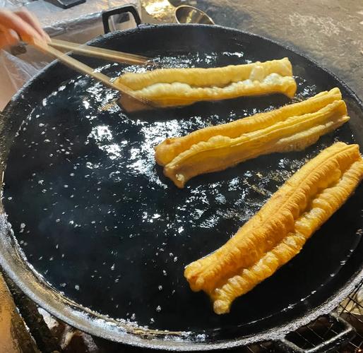 三、永乐路废墟旁的油条摊,和即将消失的清晨