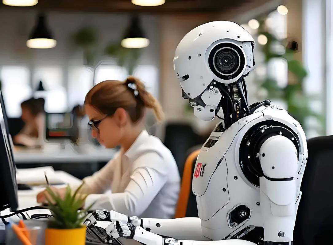 人工智能机器人取代人类办公室工作场景图