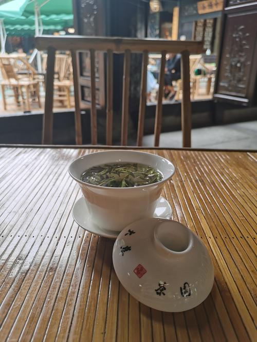 成都金沙遗址西门老茶铺太阳神鸟盖碗茶