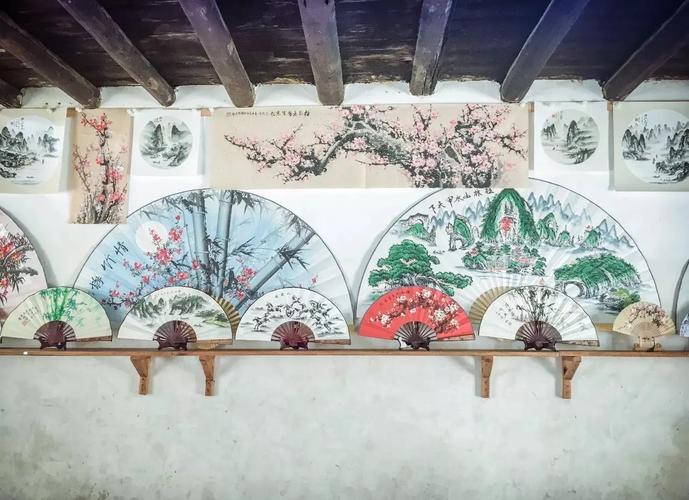 阳朔非遗手工画扇制作