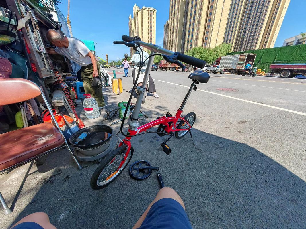 南京巷口修车铺二手机器人调自行车辐条