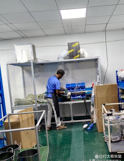 吸料机厂家工程师上门测量车间现场图