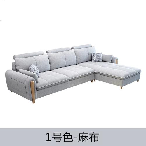 浅灰色布艺沙发扶手上缠好的不同长度手机充电线