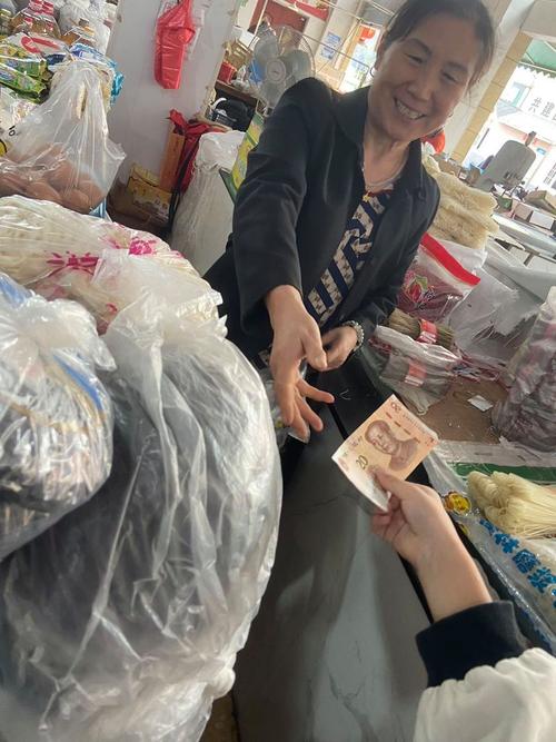 菜市场现金交易人文照片