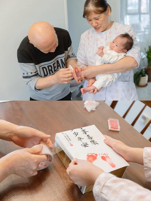 年轻夫妻抱着刚满周岁的宝宝在家整理纸质保单
