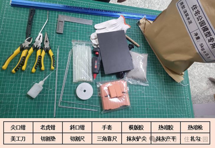 小学生在创客空间用热胶枪和纸板搭建模型