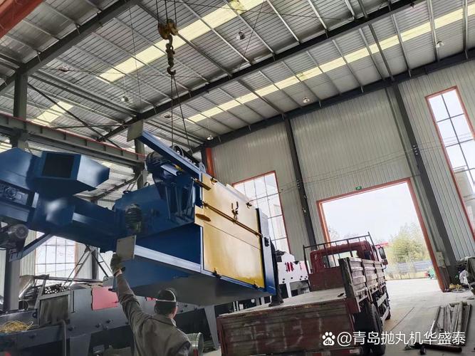 通过式抛丸清理机车间漏钢砂故障现场