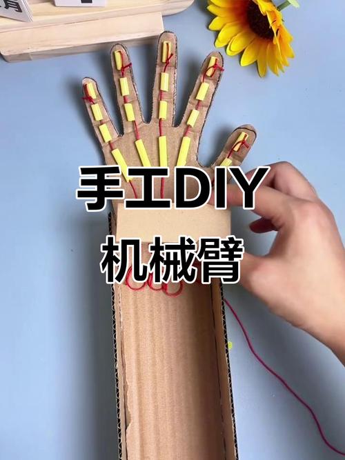 孩子用纸板制作液压机械臂模型