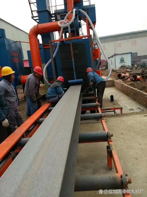 钢结构车间通过式抛丸清理机卡料现场