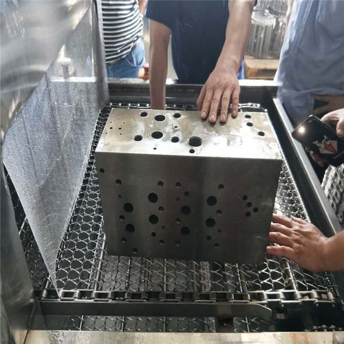工业自动清洁线清洁液压阀块切屑现场