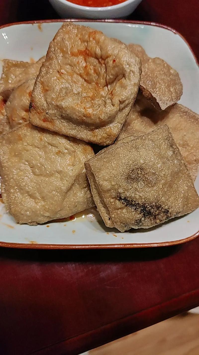 锣声歇的时候,臭干子刚煎到起壳