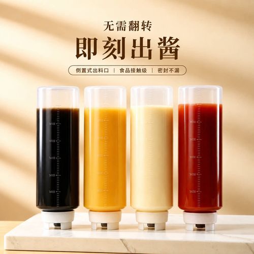 冰箱门架上整齐摆放的开封后冷藏的蚝油沙拉酱玻璃瓶
