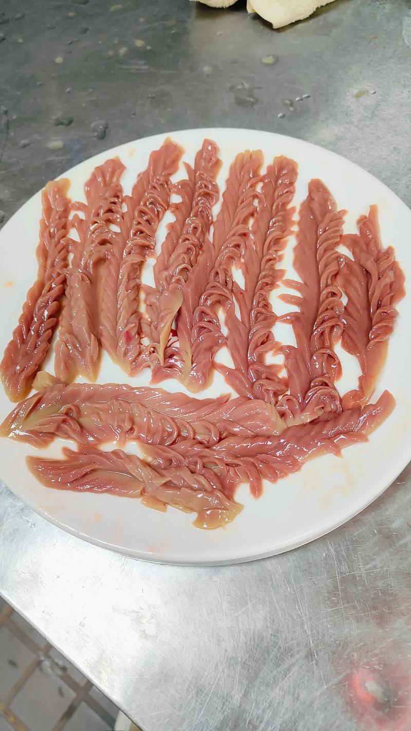 四川苍蝇馆子老板切腰花特写照片