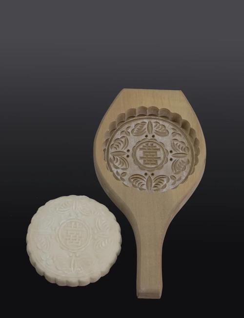 南漳传统木头印模压制的花馍成品图