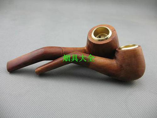 刻着西安城砖纹的枣木旱烟袋
