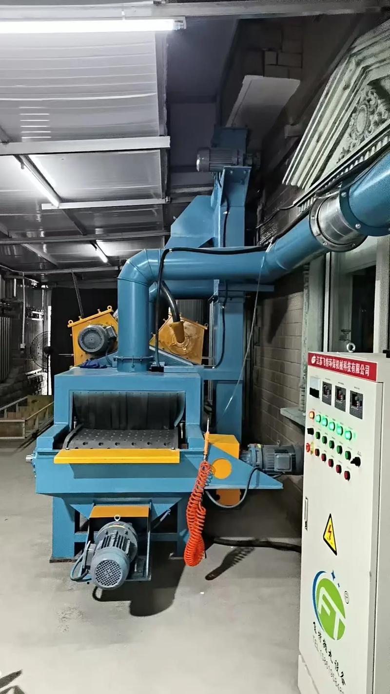 故障停工的通过式抛丸清理机生产现场