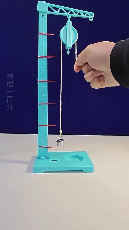中学物理动滑轮工作演示实验图