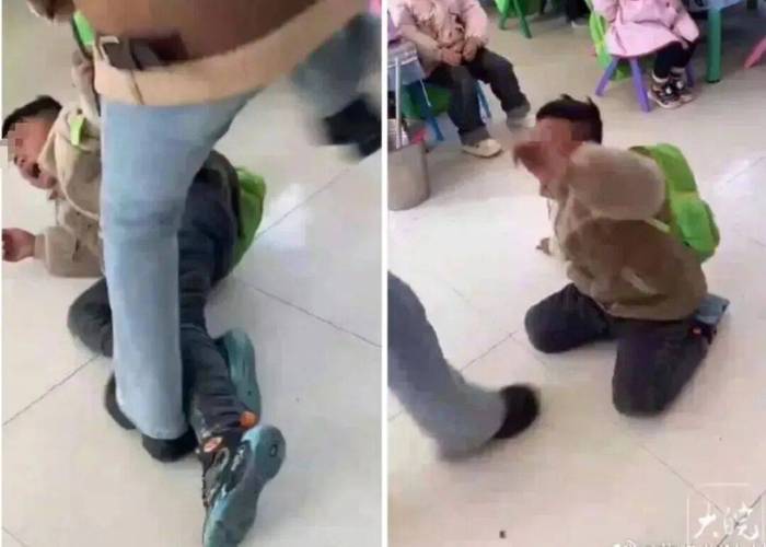 幼儿园里两个孩子发生冲突老师蹲下干预的纪录片画面