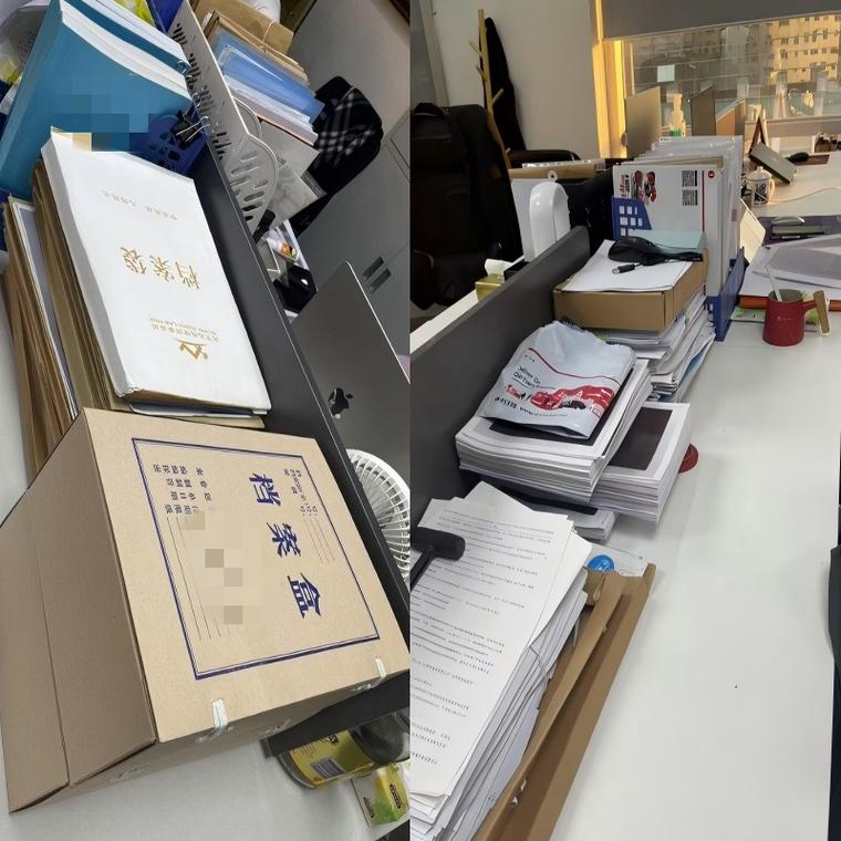 CBD写字楼加班法务工位堆满卷宗和外卖盒的实拍