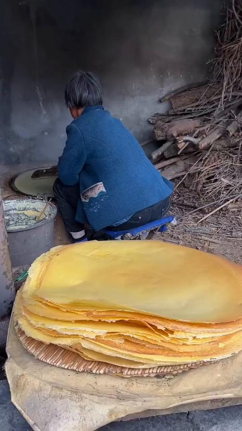 天津清晨老巷煎饼摊鏊子刮板