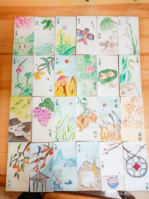 书桌上手写二十四节气亲子手作卡实拍图