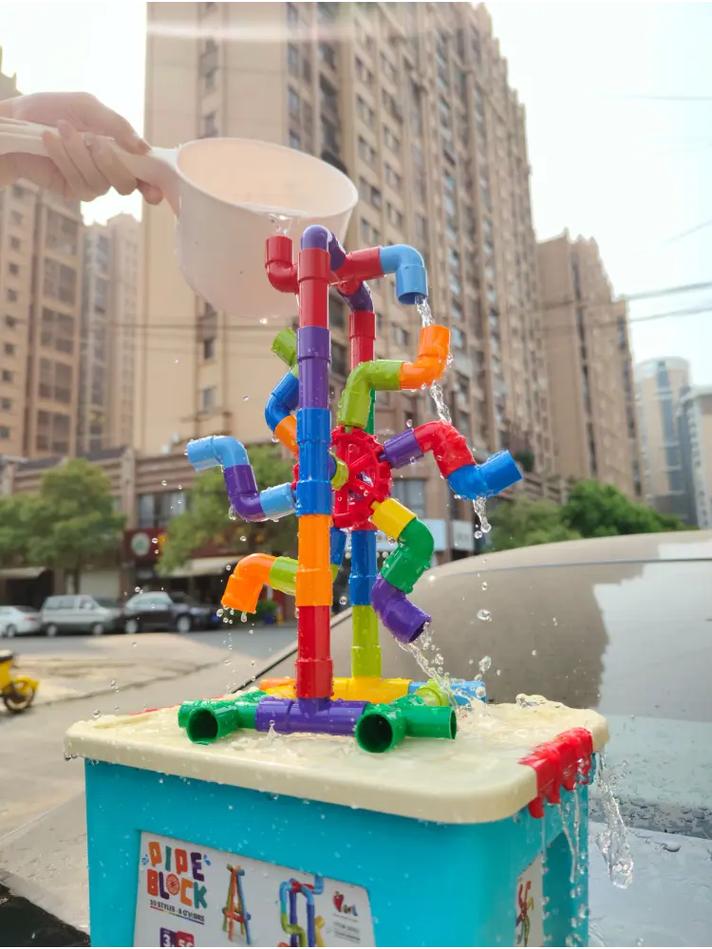儿童工业风生日派对游戏区水管搭建和齿轮联动装置