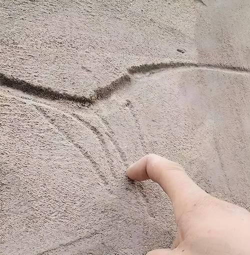 用手检验墙面起砂程度参考图