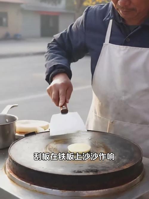 天津老煎饼摊桑木刮板实拍