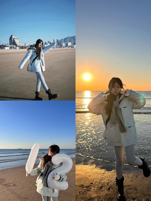 海边游客穿着牛仔裤和轻薄羽绒服看日落