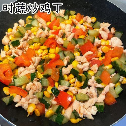 儿童餐盘里搭配了炸鸡腿和彩色时蔬