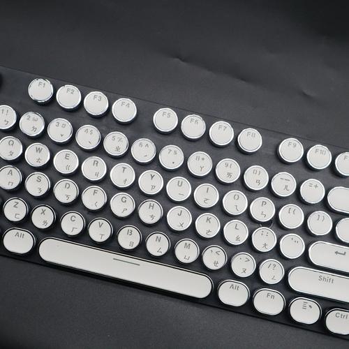 打字机键盘特写铜色键帽